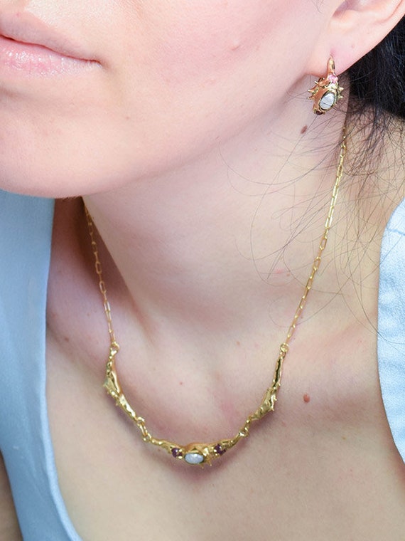 Statement necklace with irregular pearl and pink tourmalines in a raw, organic form
