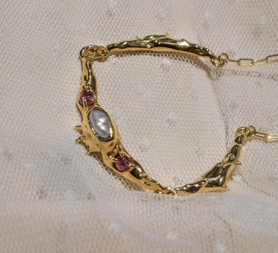 Statement necklace with irregular pearl and pink tourmalines in a raw, organic form