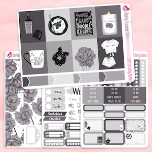 May include: A set of planner stickers in shades of grey, black, and white. The sheets feature illustrations of a marker, a bowl of yogurt, a notebook with text, a candle, a mug with cat ears, a scrunchie, flowers, and clothing, plus task lists.