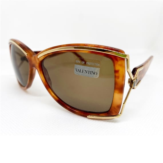 Accessoires Sonnenbrillen Retro Brillen Valentino Retro Brille braun-hellorange Allover-Druck Casual-Look 