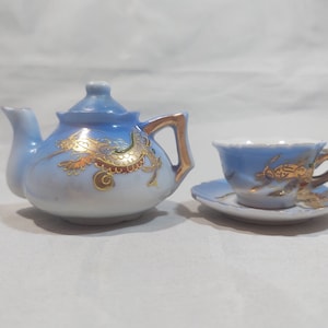 Vintage Miniature Hand painted 3 piece Dragonware Teapot with Cup and Saucer in Blue