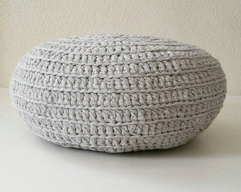 Round cushion, ottoman pouf, in xxl gray crocheted yarn