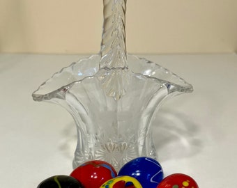 HandBlown Miniature eggs in  assorted Colors and comes in  Small Crystal Glass Basket with etched Flowers