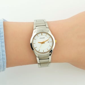 Pulsar Stainless Steel Watch: Silver Oval Case, Date Function (Original Box)