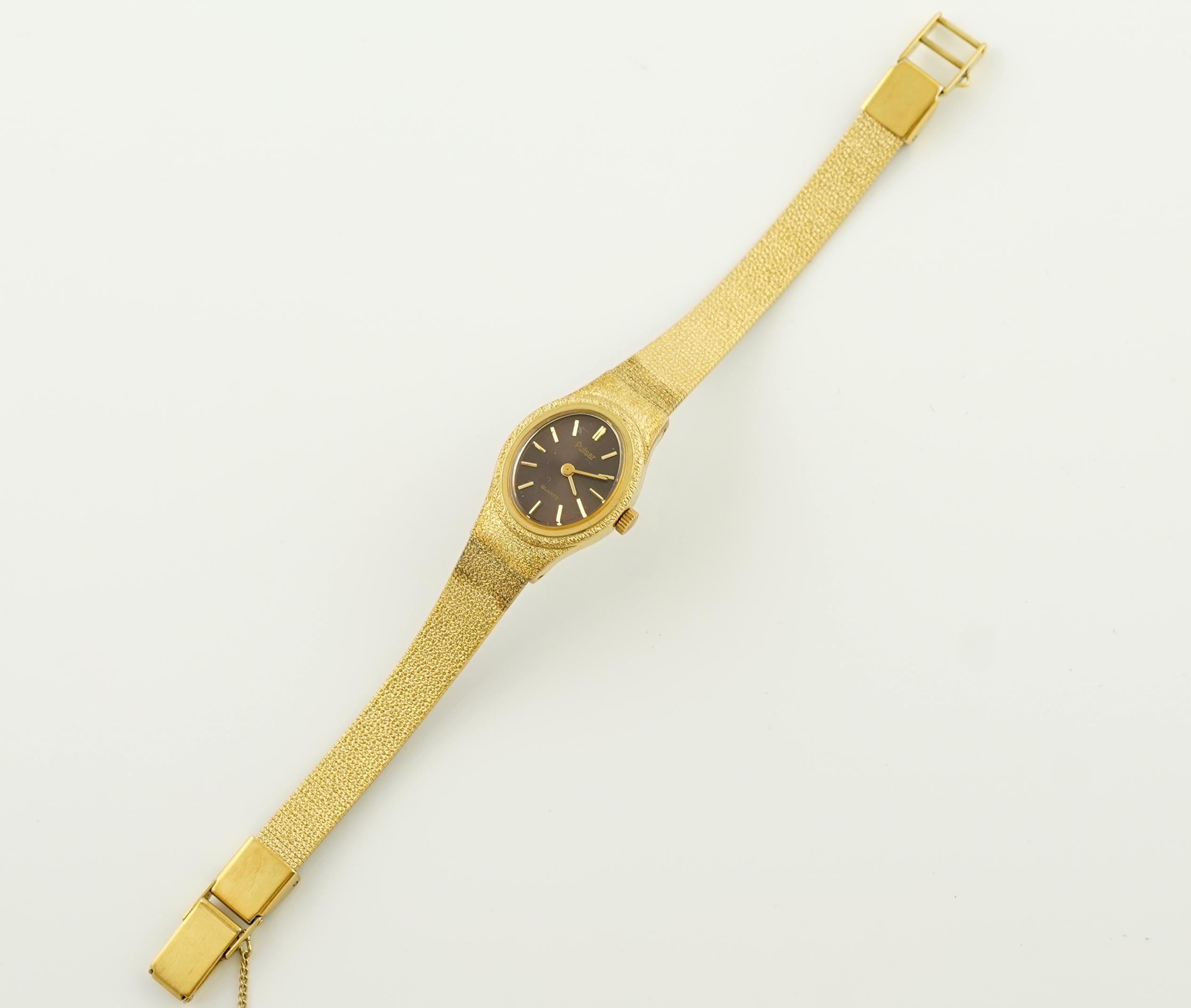 vintage Pulsar women\'s gold-tone wristwatch featuring an eye-shaped or oval case Vintage Pulsar Gold Watch, Womens Rotary Oval Wristwatch  main image 2
