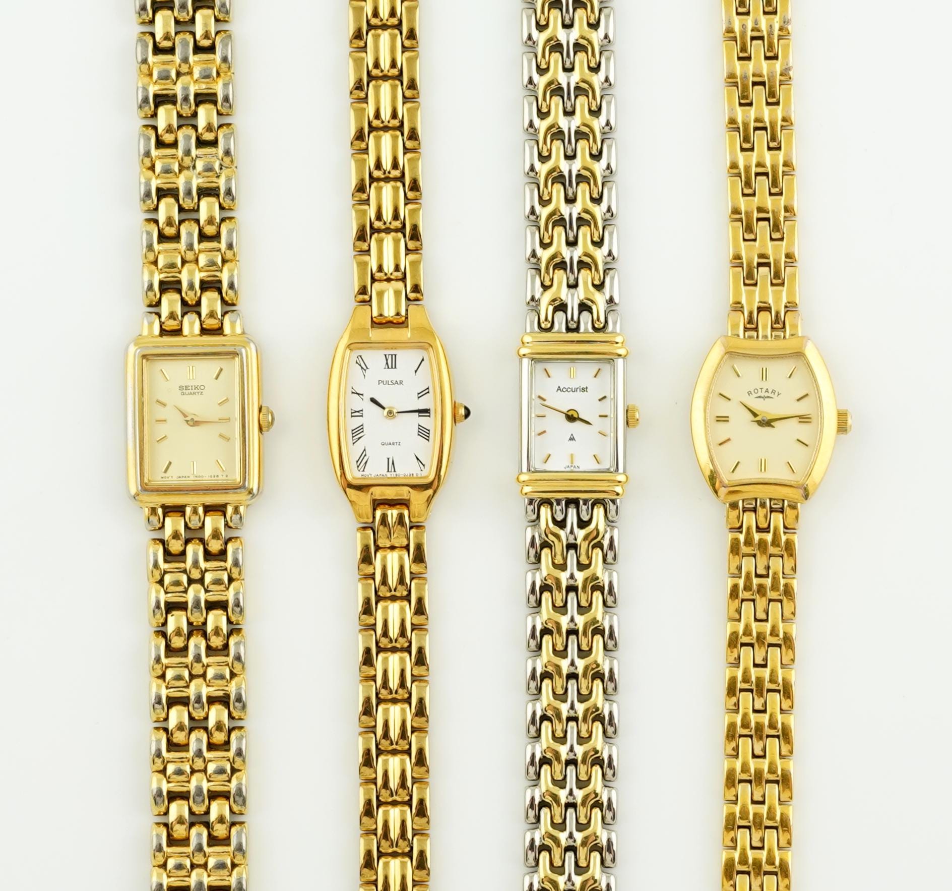 Montre-bracelet à quartz vintage Pulsar (Seiko) pour hommes - Boîtier en acier inoxydable avec revêtement en métal jaune avec bracelet en cuir noir - Très bon état - Canada