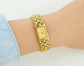 Vintage Seiko Womens Gold Watch with Rectangular Case, Curved Crystal, Wide Metal Bracelet