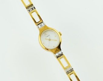 Vintage Timex Women's Gold oval Watch, Mother-of-Pearl Dial, Cocktail Style, Quartz watch