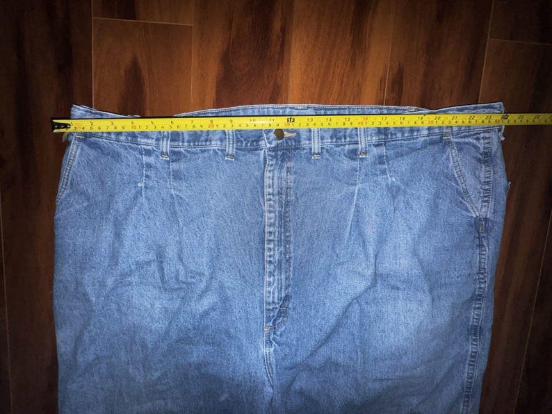 Pantalones vaqueros Wrangler Rugged Wear Angler talla 52x32 con cintura elástica y pliegues grandes. imagen 7