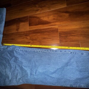 Pantalones vaqueros Wrangler Rugged Wear Angler talla 52x32 con cintura elástica y pliegues grandes. imagen 9