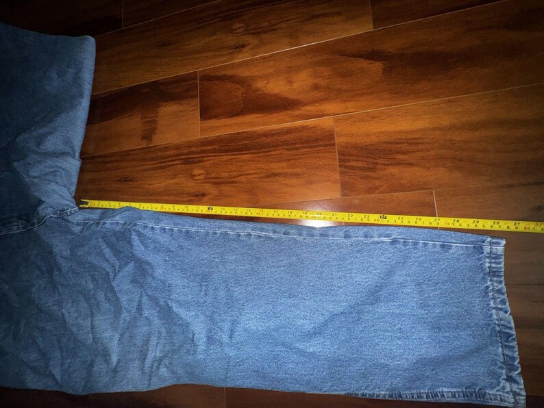 Pantalones vaqueros Wrangler Rugged Wear Angler talla 52x32 con cintura elástica y pliegues grandes. imagen 9