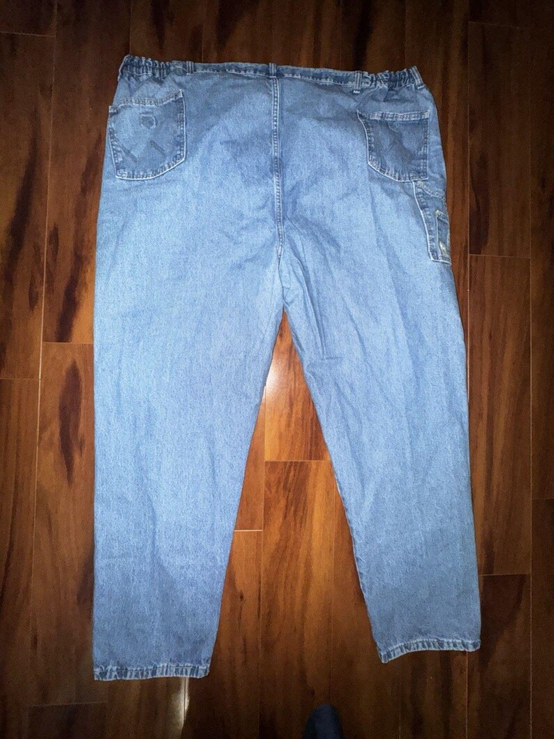 Pantalones vaqueros Wrangler Rugged Wear Angler talla 52x32 con cintura elástica y pliegues grandes. imagen 12