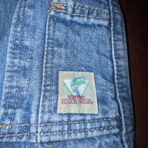 Pantalones vaqueros Wrangler Rugged Wear Angler talla 52x32 con cintura elástica y pliegues grandes. imagen 16