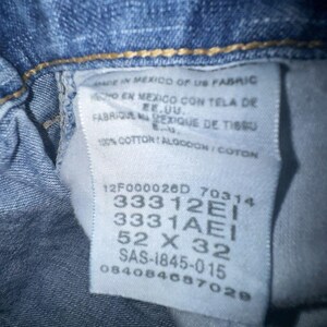 Pantalones vaqueros Wrangler Rugged Wear Angler talla 52x32 con cintura elástica y pliegues grandes. imagen 11