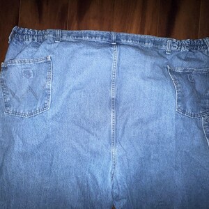 Pantalones vaqueros Wrangler Rugged Wear Angler talla 52x32 con cintura elástica y pliegues grandes. imagen 15
