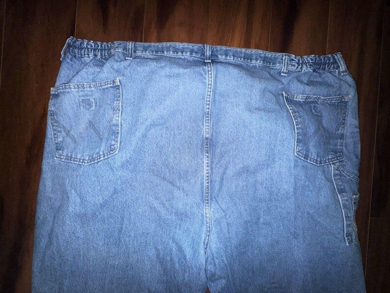 Pantalones vaqueros Wrangler Rugged Wear Angler talla 52x32 con cintura elástica y pliegues grandes. imagen 15