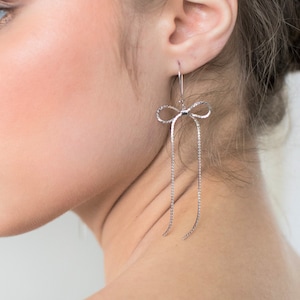 Modern earrings, Elegant earrings, Bow jewelry, Long silver earrings, Silver statement earrings, Long silver dangle earrings, Unique earring