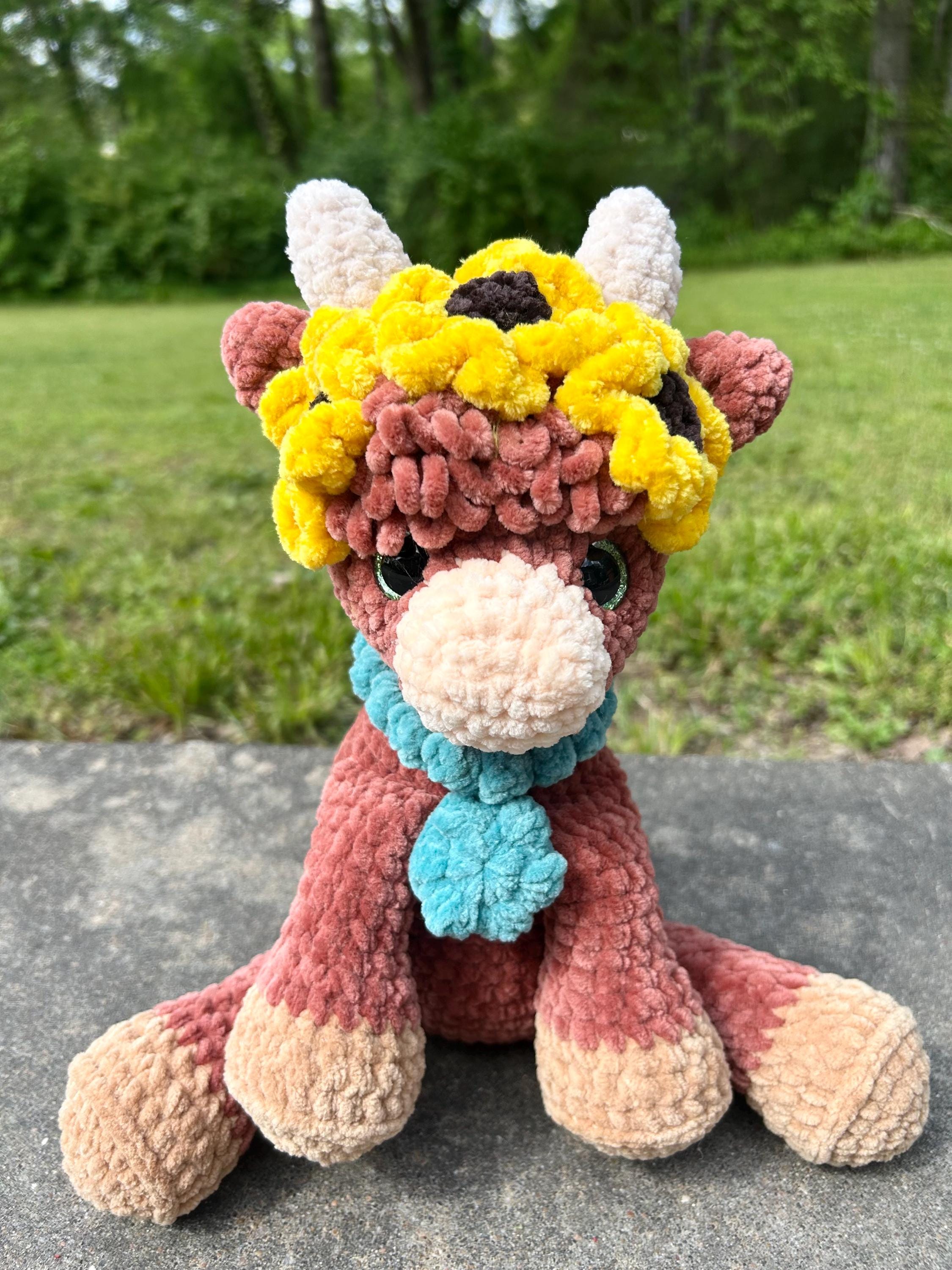 30 Sunflower Cow Crochet Patterns to Bring Rustic Farm Charm to Your Home 28 Highland Cow Crochet Pattern with Spring Flower Accents