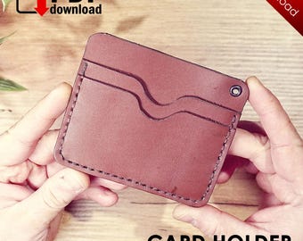 May include: A brown leather card holder with a stitched edge and a hole for a key ring. The card holder is 9x10.5 cm in size. The text "CARD HOLDER" and "SIZE: 9X10.5CM" is printed below the card holder.