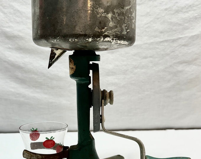 Vintage Seald Sweet Metal Tabletop Juicer with Green Wooden Handle and Clear Tomato Juice Glass