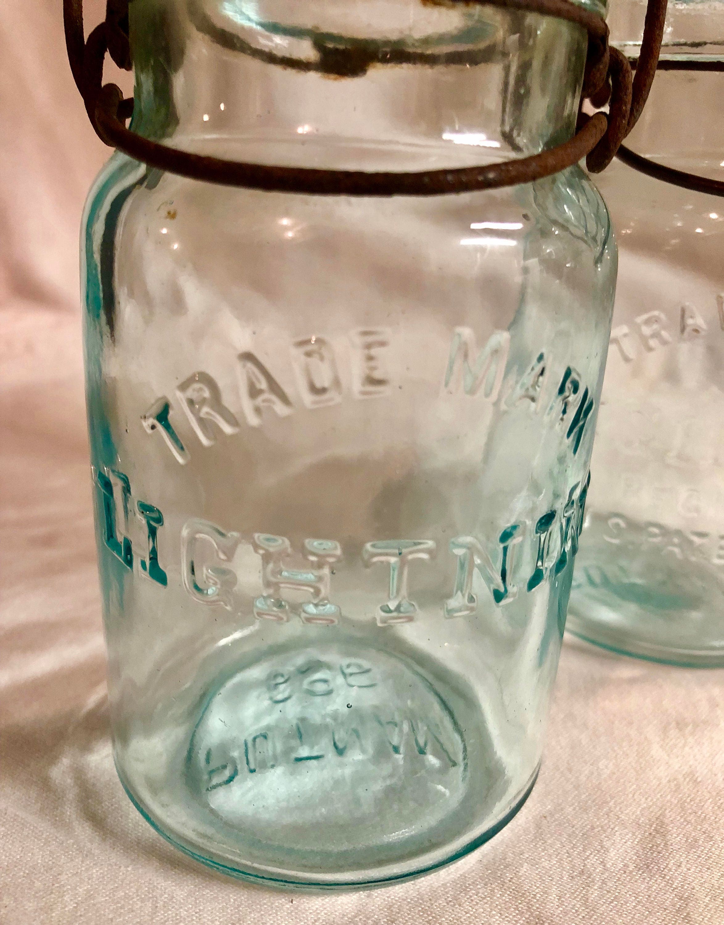 Three Medium Antique Green Tinted 'Lightening Fruit/Canning Jars