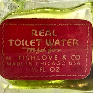 ヴィンテージ「本物のトイレットウォーター」ガラス香水瓶、H. フィッシュラブ、シカゴ、イリノイ州 1931 年