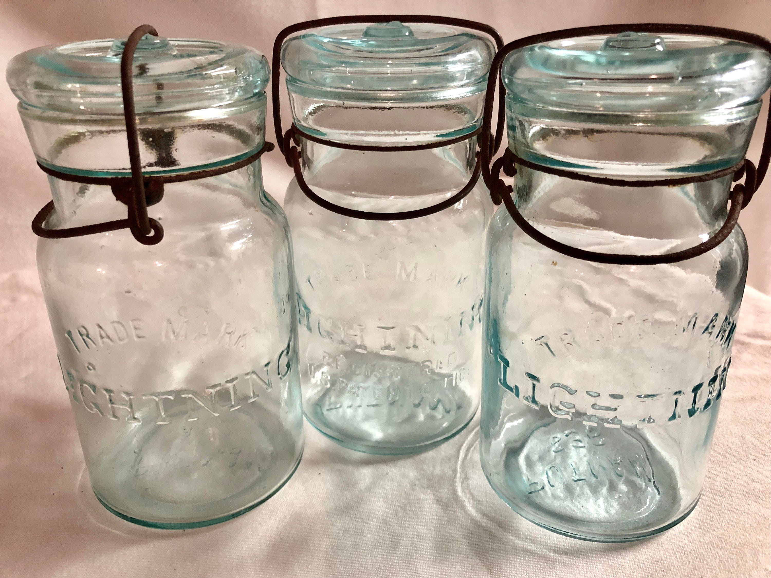 Three Medium Antique Green Tinted 'Lightening Fruit/Canning Jars