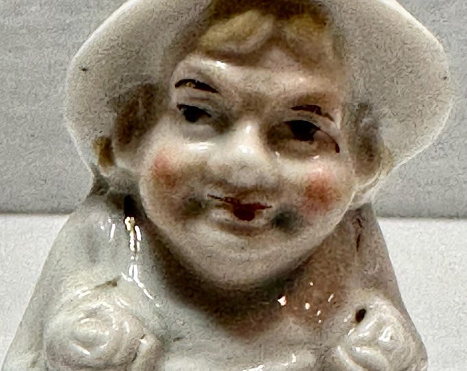 Vintage Porcelain Man with Roses Salt Figurine