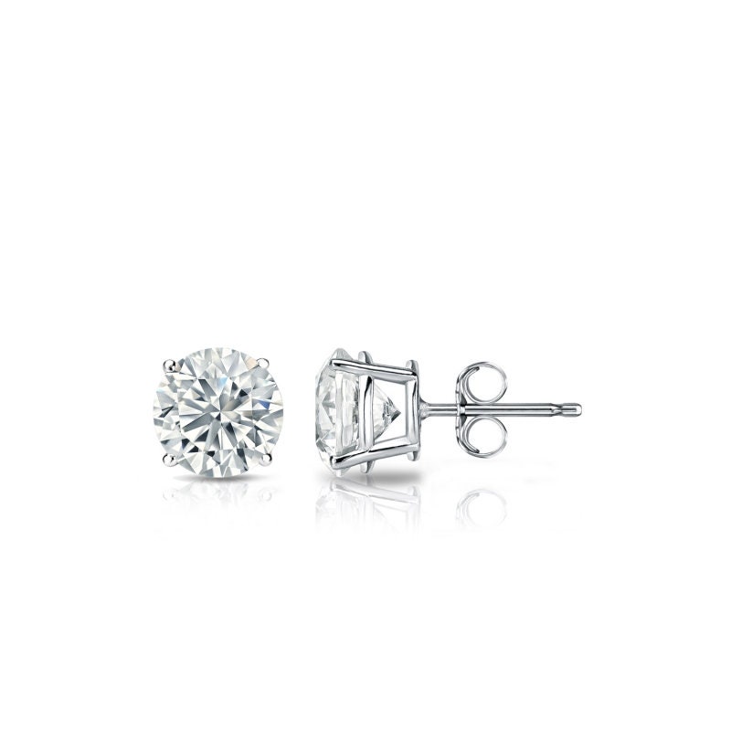 0.95ct. Tw. Diamond Halo Stud Earrings 14K White Gold