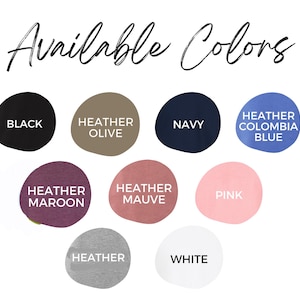 May include: Image displaying a selection of available colors. The colors include black, heather olive, navy, heather Columbia blue, heather maroon, heather mauve, pink, heather, and white. The text "Available Colors" is written in a cursive font.