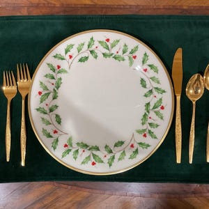 Christmas LENOX Holiday Pattern (1) plate available. Beautiful 10 inch plate. Holly and berries gold rim. ONLY 1 plate left.