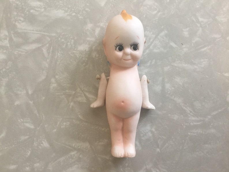 porcelain kewpie doll
