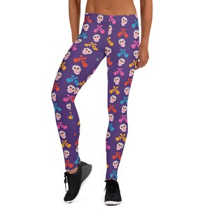 May include: Purple leggings with a colorful skull and ukulele pattern.
