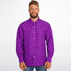 May include: A long-sleeved button-down shirt with a geometric pattern in shades of purple.