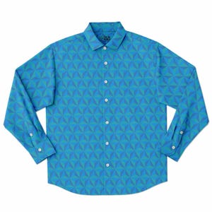May include: A long-sleeved button-down shirt with a geometric pattern in shades of blue and green. The shirt has a collar and a button-up front.