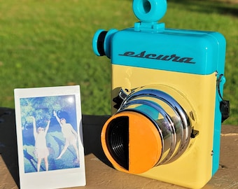 Escura instant 60s Splitzer camera accessory