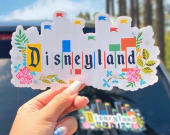 Vinilo adhesivo para coche con diseño floral de Disneyland en tonos pastel (6,84" x 3,86")