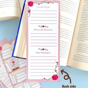 May include: Pink and white bookmark with space for notes, decorated with red roses and green vines. The bookmark has sections for a favorite quote, memorable moments, and other highlights. The back side offers expanded space for notes and thoughts.