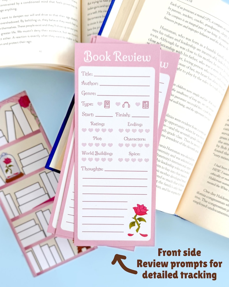 May include: Pink book review bookmarks with prompts for detailed tracking. Each bookmark features spaces for title, author, genre, and rating, with a rose illustration. The text "Book Review" is at the top.