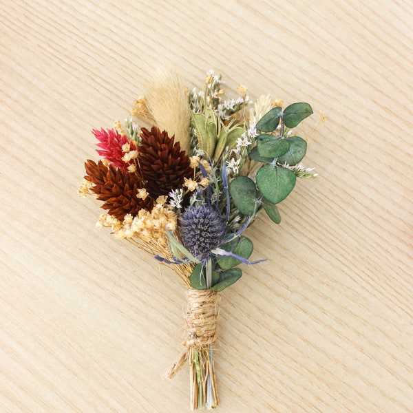 Blue Thistle Boutonniere + Eucalyptus + Burnt orange Chocolate Neutral tones