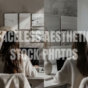 May include: Two people sit at a desk with laptops, working. The room is decorated in a minimalist style with white walls and framed prints of seascapes. The desk is made of wood and has a white surface.