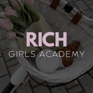 May include: A white wicker basket with a bouquet of pink tulips, a croissant, and a white coffee cup. The basket is attached to a bicycle handlebar. The text "RICH GIRLS ACADEMY" is printed in black on a white background.