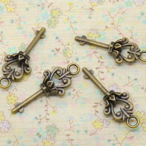 Lot De 25 Clés Pendentifs Steampunk Vintage - Motifs Cœur, Aile, Couronne - Couleur Argent - Neuf
