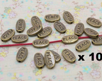 100 x perle intercalaire PEACE métal bronze trou 1 mm