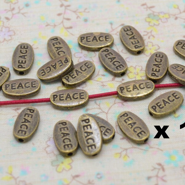 100 x perle intercalaire PEACE métal bronze trou 1 mm