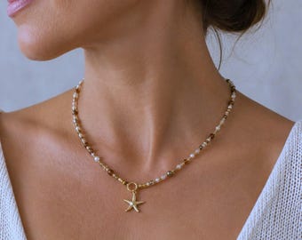 Personalized amber, brown, and gold pearl choker necklace, boho summer style, with a starfish, freshwater pearl, moon, or initial charm pendant.