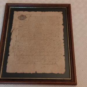 Antigua carta de correo manuscrita con fecha de documento y firmada en 1687 en marco