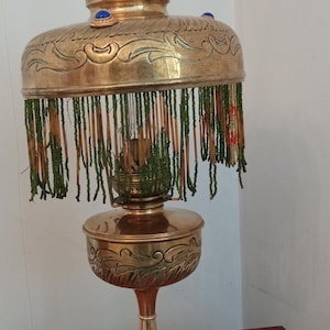 Oil lamp with tassels known as the Parisienne, 19th century