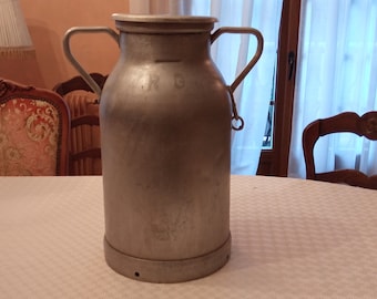 Old aluminum milk jug from the RG brand, capacity 20 liters