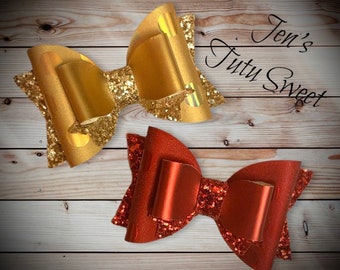 Red hair bow… gold hair bow